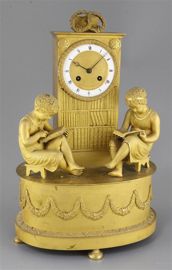 A French Empire ormolu mantel clock, width 11in. height 17in.